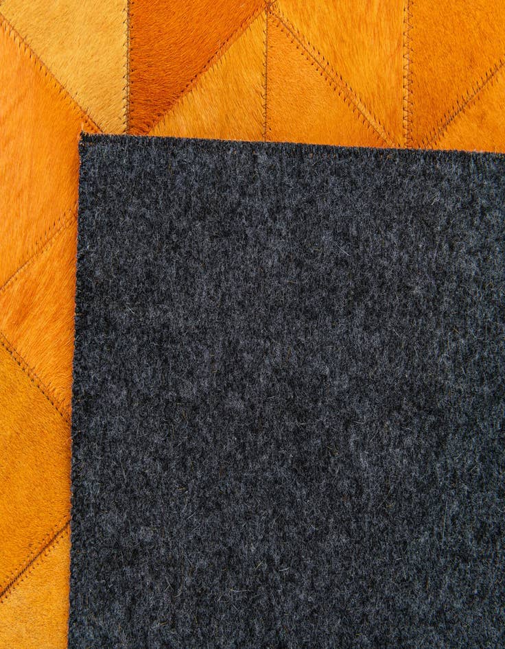 Detail image of  5' 1 x 8' 1 Cowhide Stocks Rug