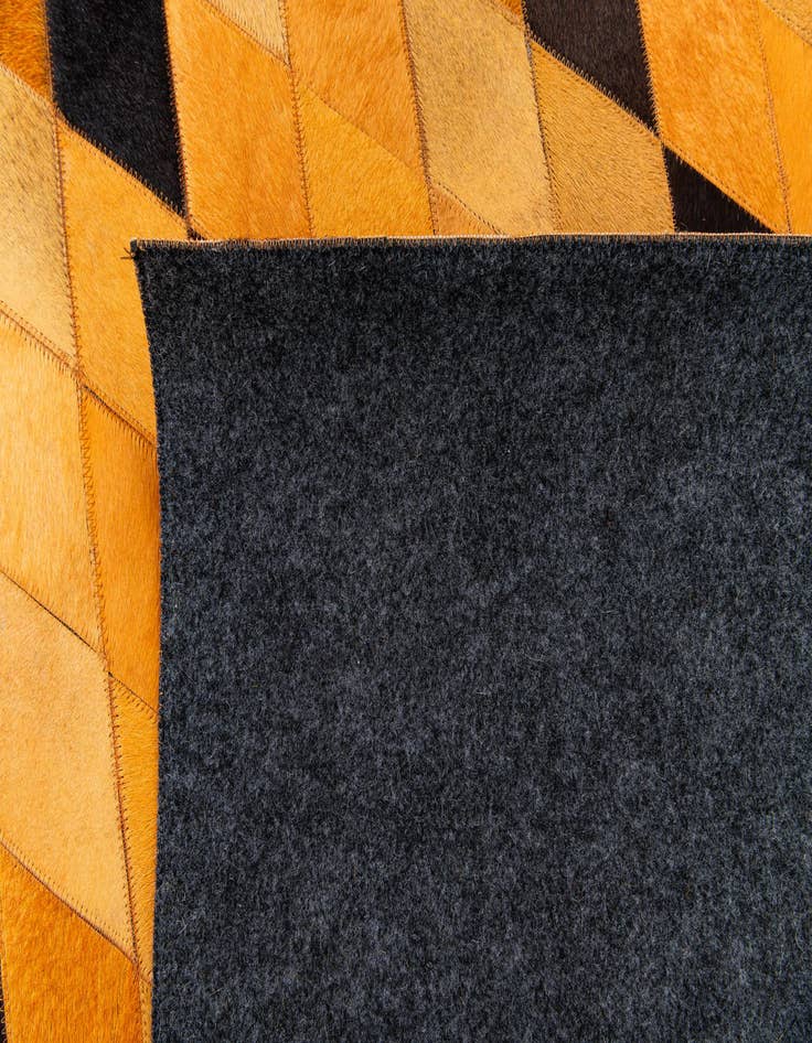Detail image of  5' 1 x 8' 1 Cowhide Stocks Rug