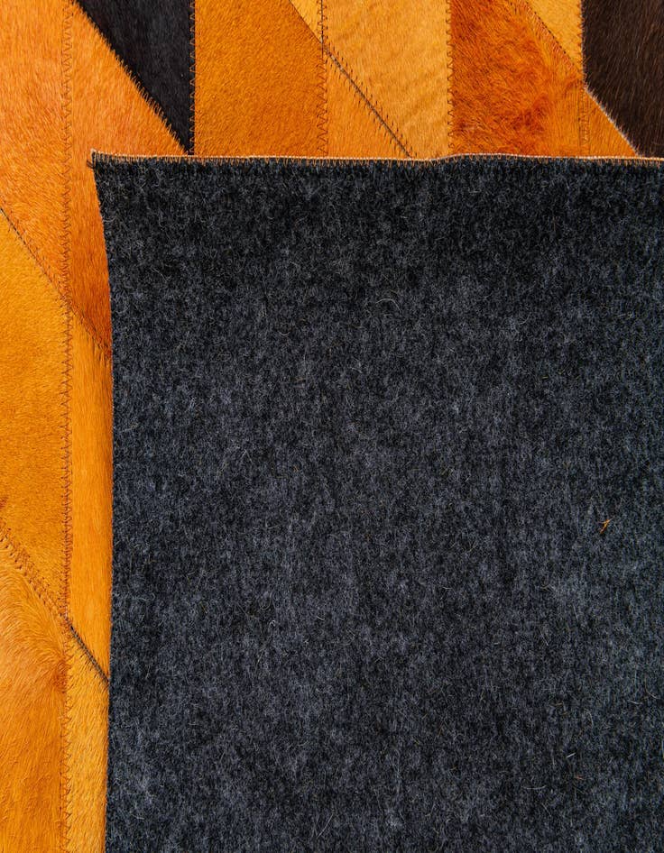 Detail image of  5' 1 x 8' 1 Cowhide Stocks Rug