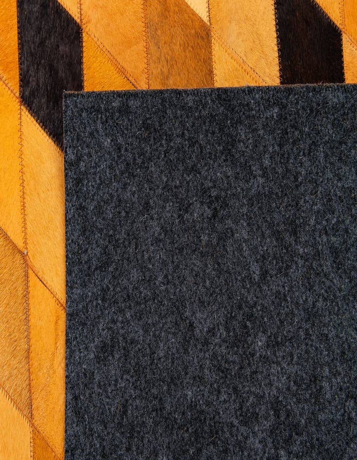 Detail image of  5' 1 x 8' Cowhide Stocks Rug