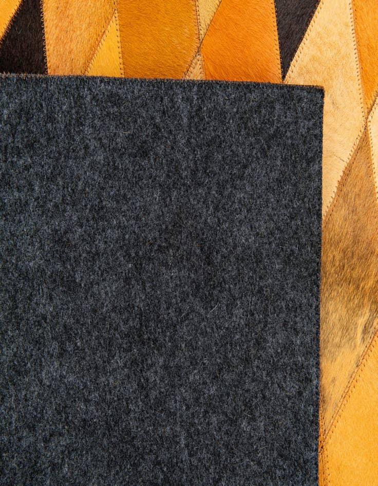 Detail image of  5' 1 x 7' 11 Cowhide Stocks Rug