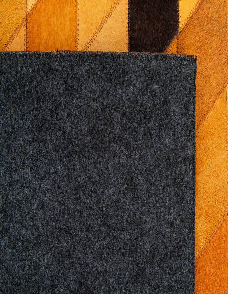 Detail image of  5' 1 x 8' Cowhide Stocks Rug