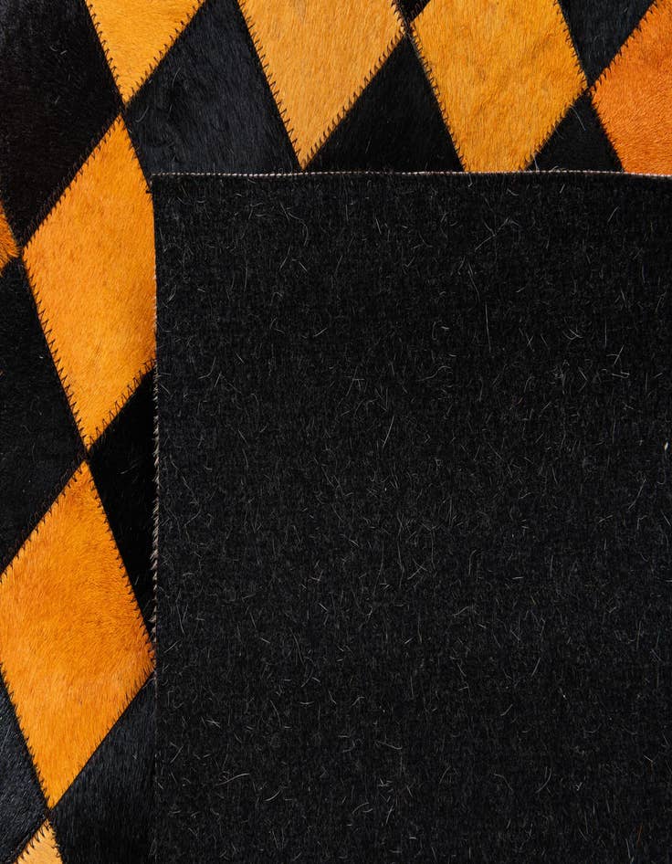 Detail image of  5' x 7' 11 Cowhide Stocks Rug