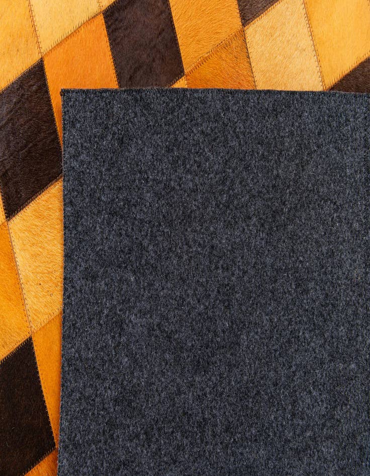 Detail image of  5' 1 x 8' Cowhide Stocks Rug