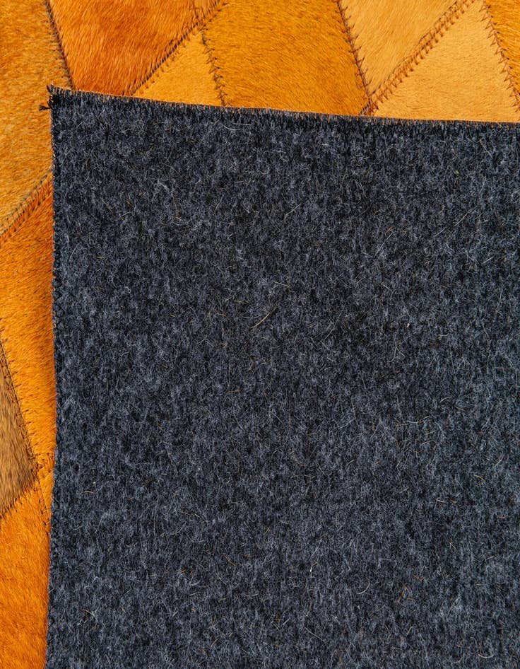 Detail image of  5' 3 x 8' 2 Cowhide Stocks Rug