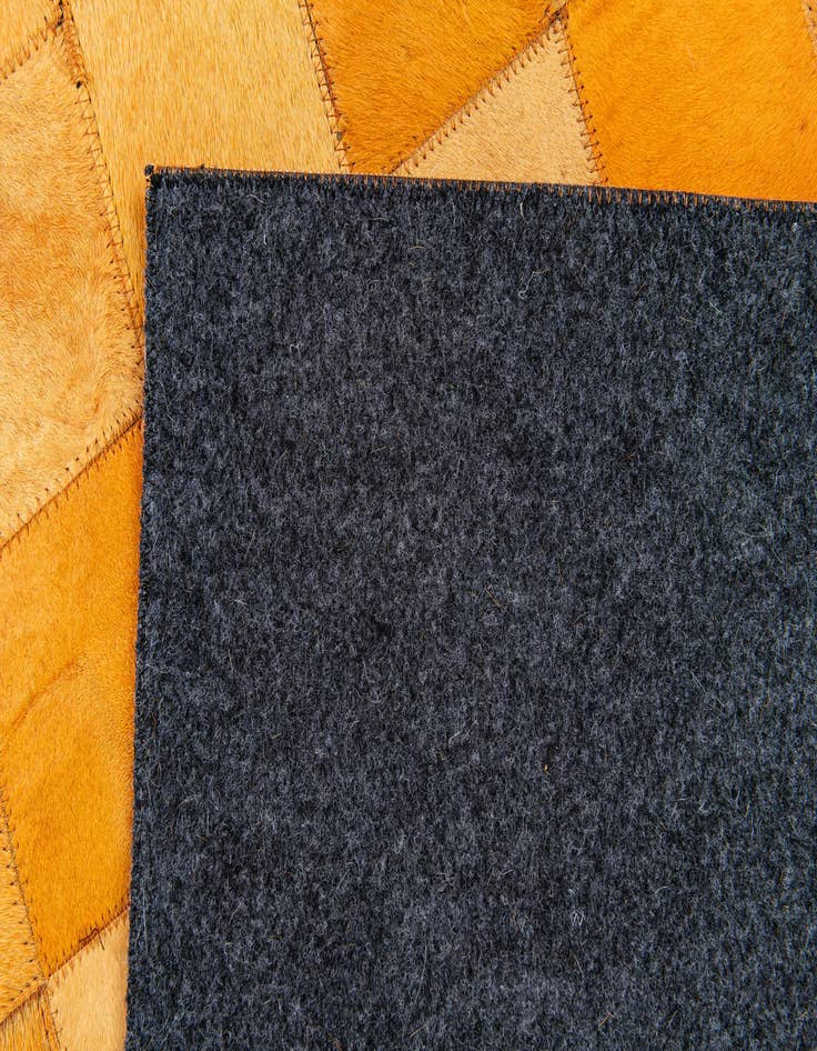 Detail image of  5' 2 x 8' Cowhide Stocks Rug