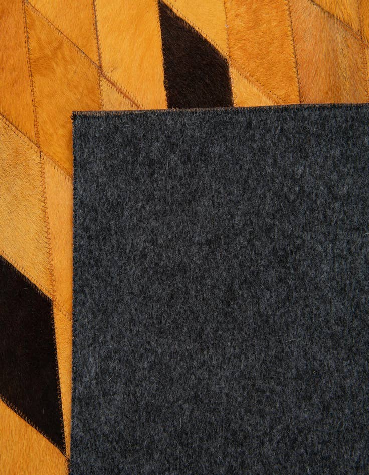 Detail image of  5' 1 x 8' Cowhide Stocks Rug