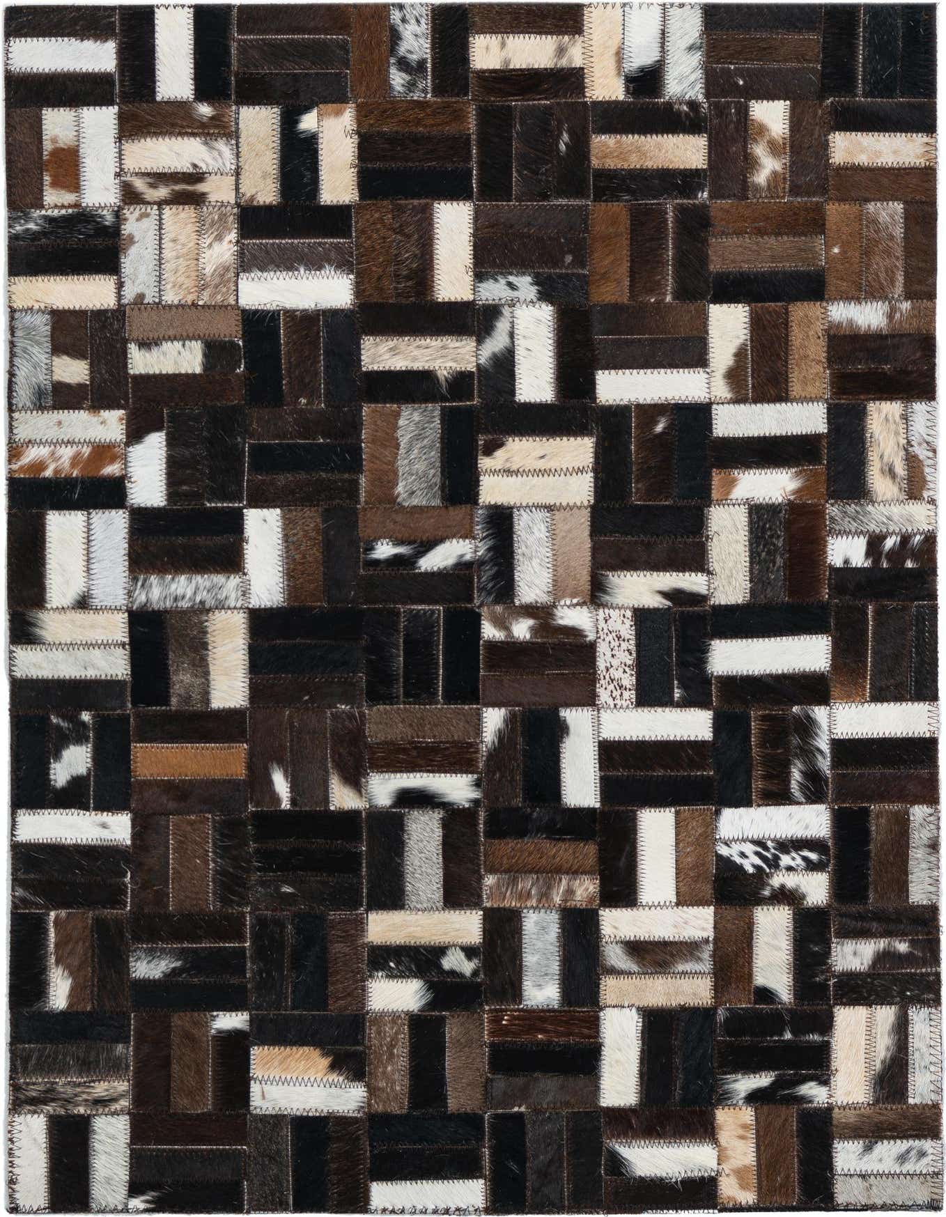 A 2x3 rectangular Cowhide Leather rug featuring a modern, abstract patchwork design in various shades of brown, black, white, and tan.