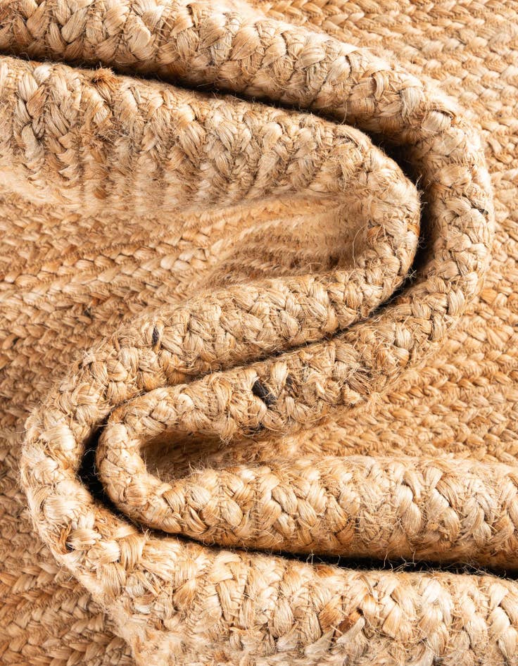 Detail image of  3' 1 x 5' 1  Hand Scallop Braided Jute Rug