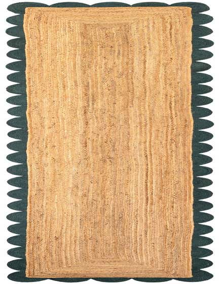 A 16 ft natural braided jute runner rug with a distinctive dark green scalloped border, perfect for a hallway.