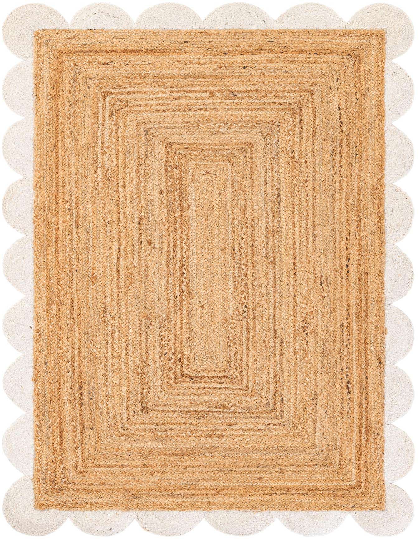 A 4x6 rectangular natural jute rug with a modern braided texture and an ivory scalloped border.