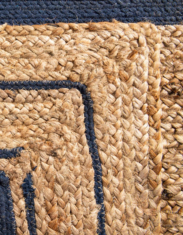 Detail image of  6' 1 x 9'  Hand Braided Jute Rug