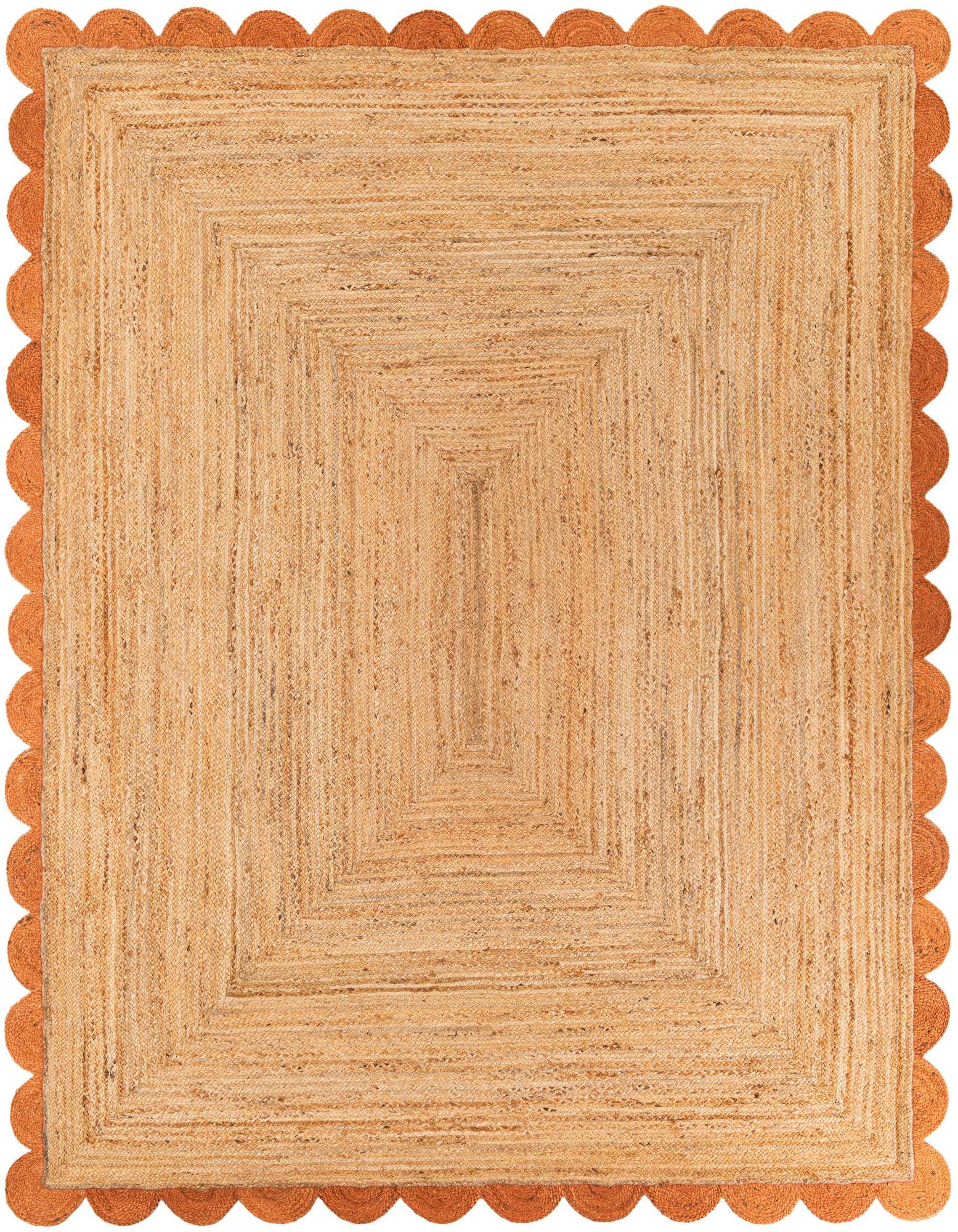 A rectangular 8x10 natural jute area rug with a distinctive terracotta scalloped border, perfect for a modern living room.