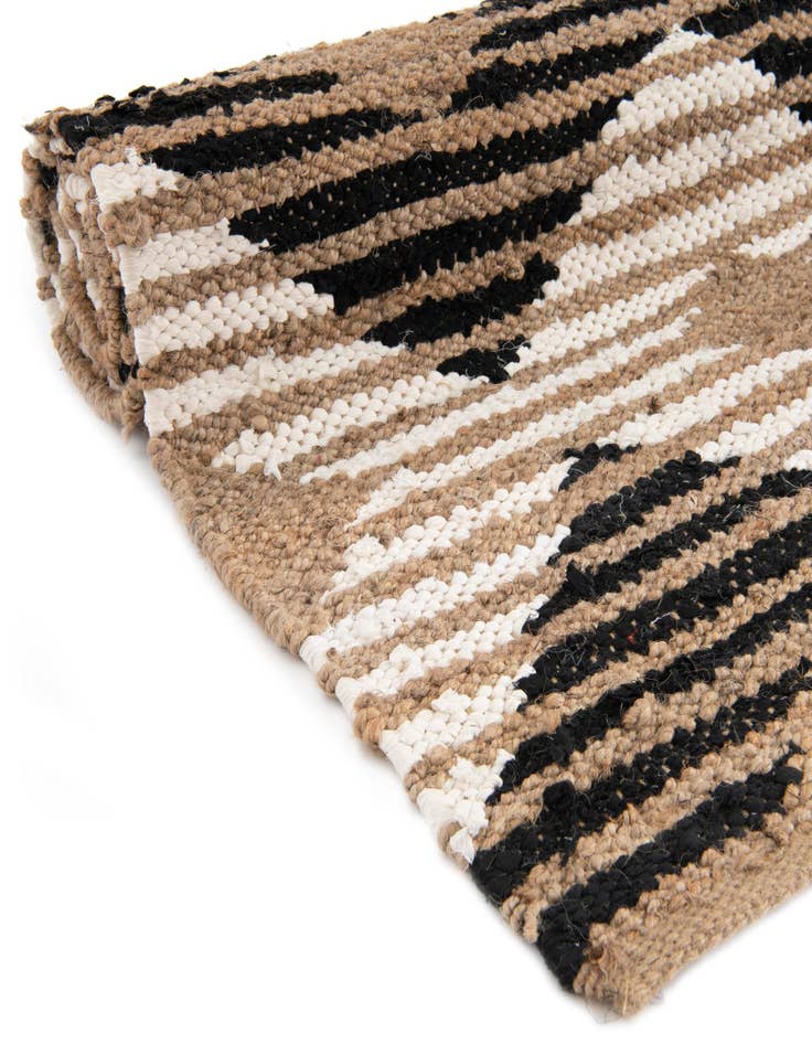 Detail image of  4' 1 x 6' 1  Hand Woven Chindi Jute Rug