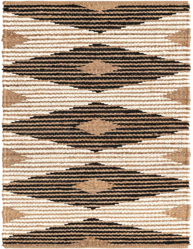 A natural black 8 ft runner rug with a Southwestern geometric pattern, made from jute and cotton, perfect for a hallway or kitchen.