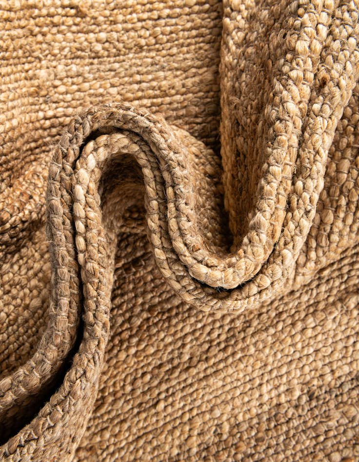 Detail image of  5' 1 x 8'  Hand Braided Jute Rug