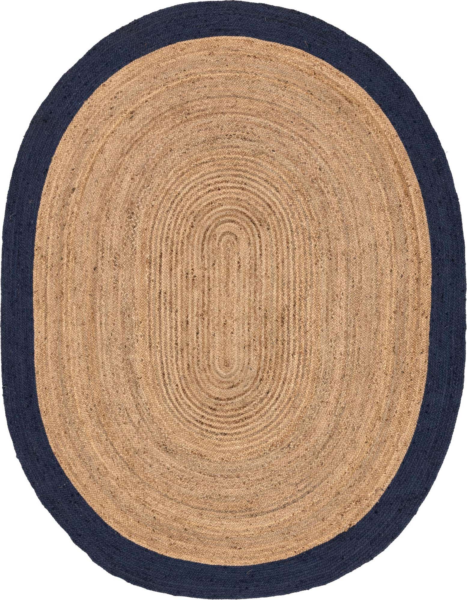 An 8' x 10' oval jute rug with a natural tan braided center and a dark navy blue border, featuring a textured, flatweave construction.