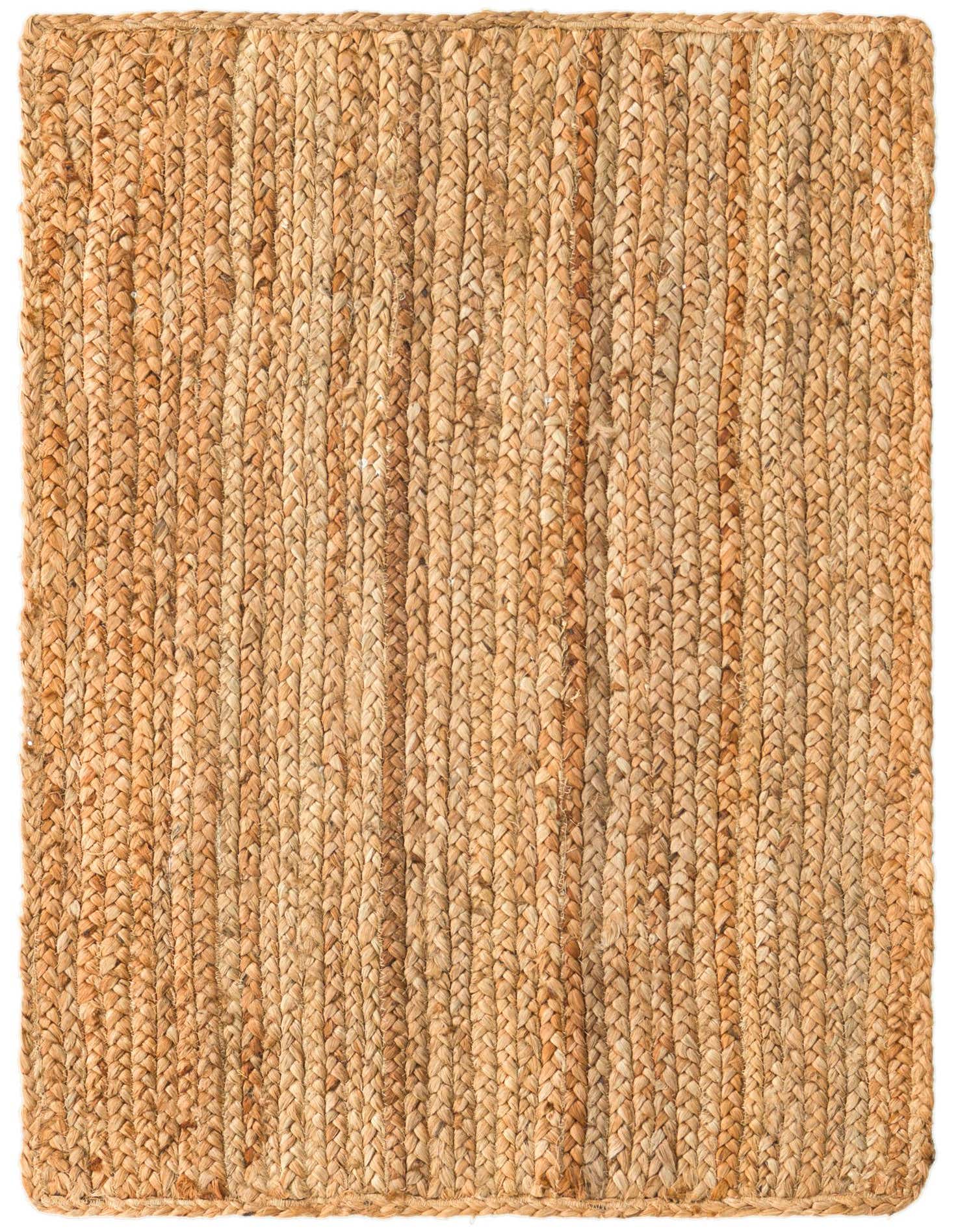 A 2x3 rectangular Braided Jute Luxe rug in natural brown and tan tones, featuring a textured, braided flatweave.