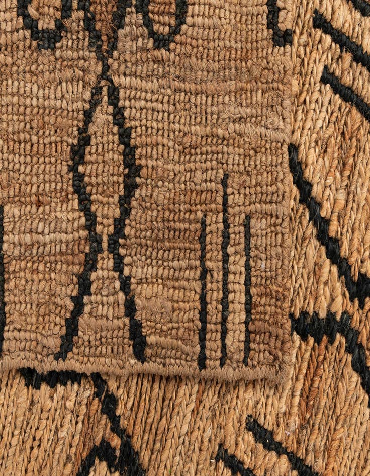 Detail image of  5' 4 x 7' 6 Braided Jute Rug