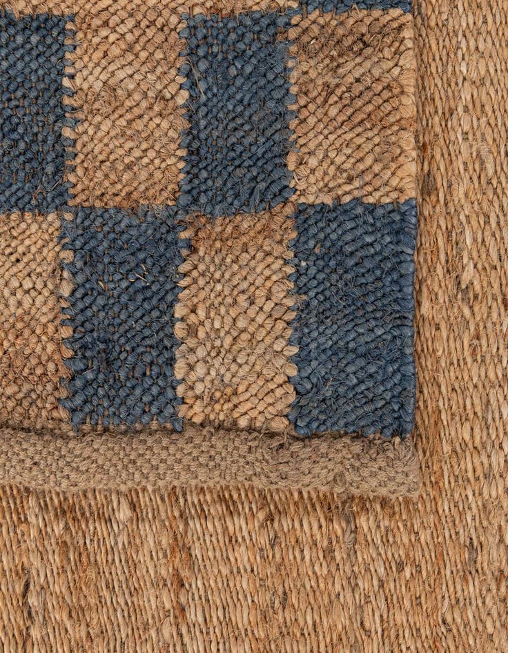 Detail image of  5' 2 x 8' 1  Hand Braided Jute Rug