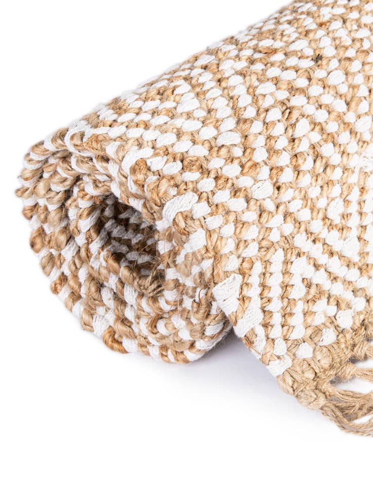 Detail image of  4' 1 x 6' 1  Hand Woven Braided Jute Rug