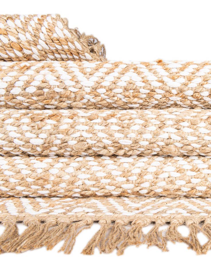 Detail image of  4' 1 x 6' 1  Hand Woven Braided Jute Rug