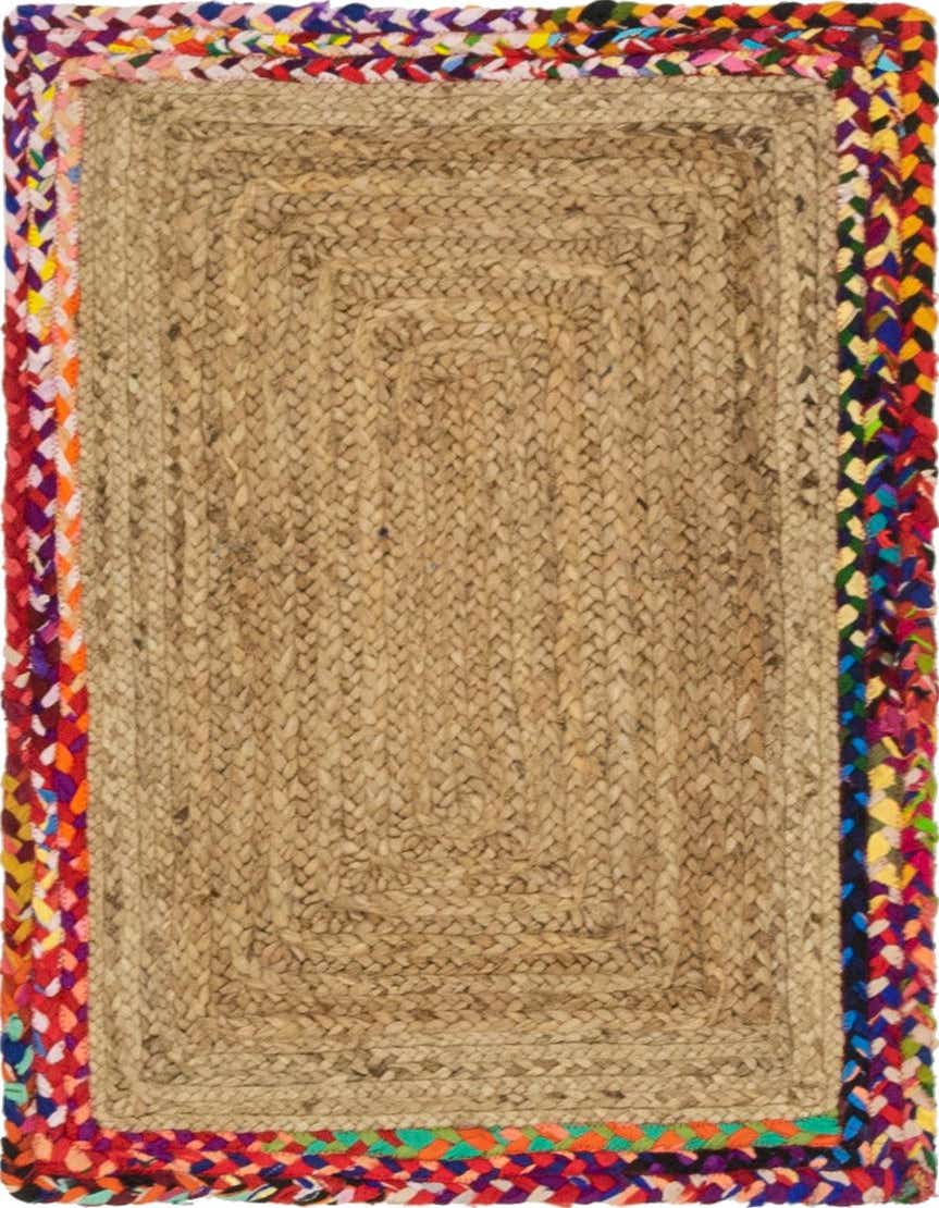 A rectangular 2x3 braided jute rug with a natural brown center and a vibrant, multicolored braided border.