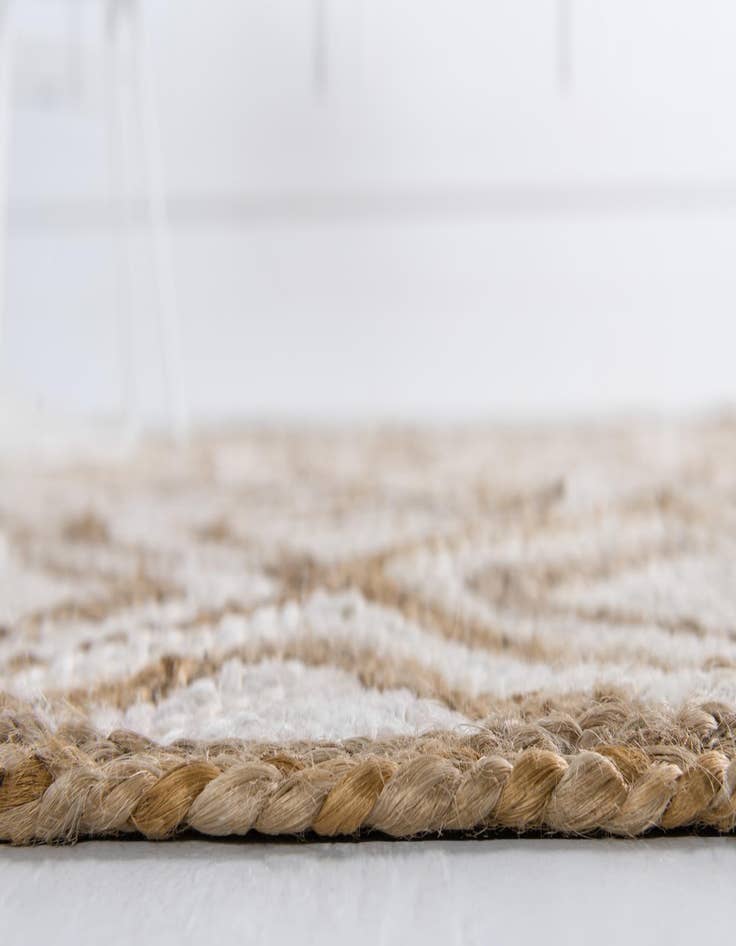 Detail image of  5' 1 x 8'  Hand Braided Jute Rug