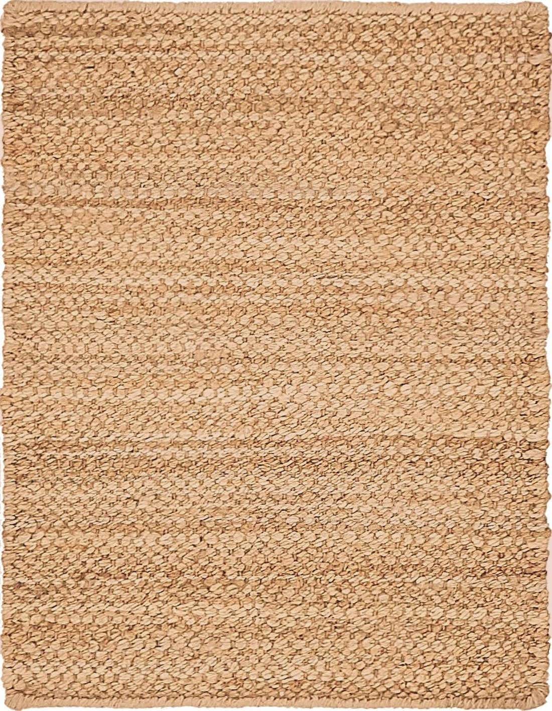 A 2x3 rectangular Chunky Jute rug in natural brown and tan tones, featuring a textured, flatweave pattern.