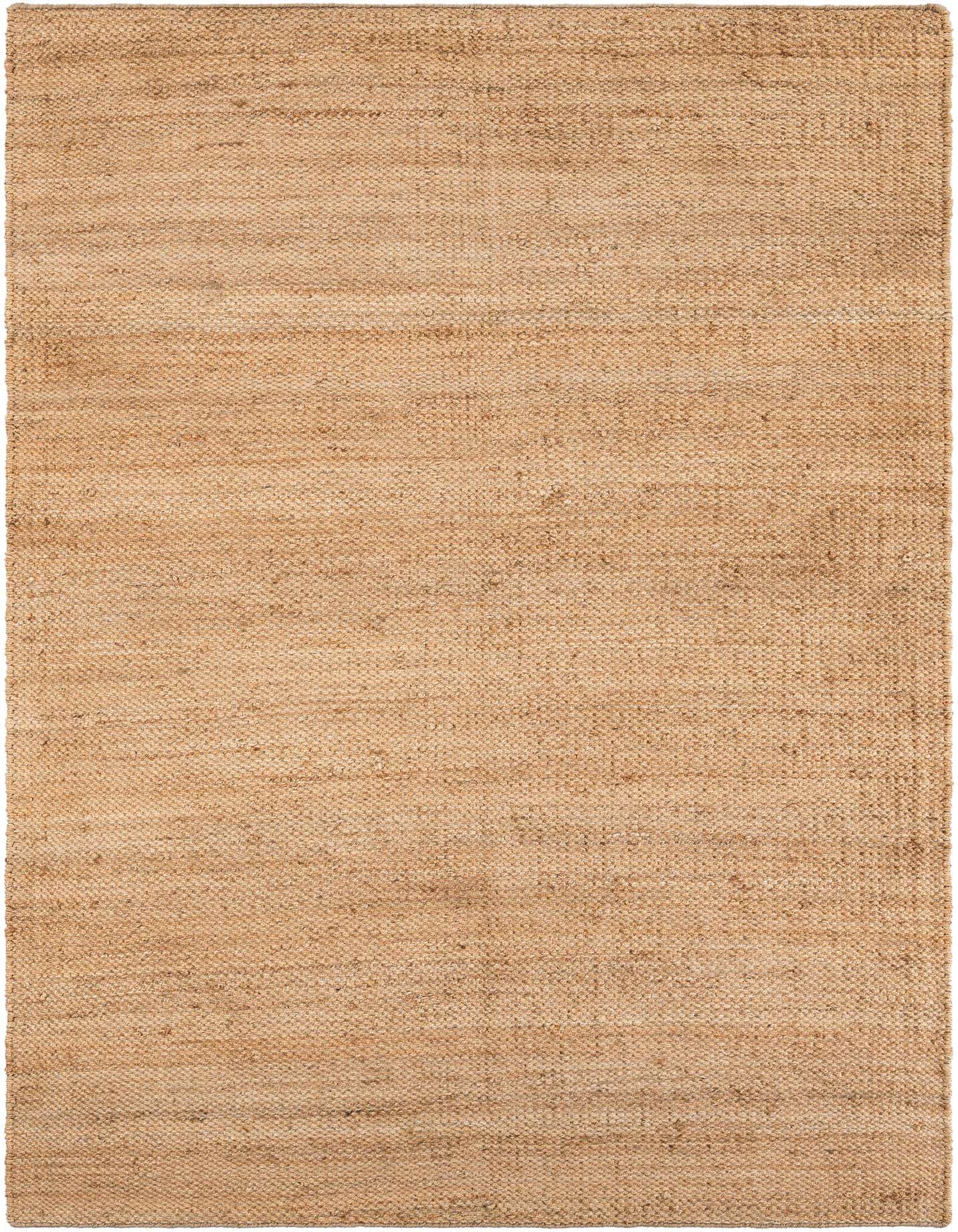 A 7x10 rectangular Chunky Jute rug in natural brown and tan tones with a textured, flatweave pattern.