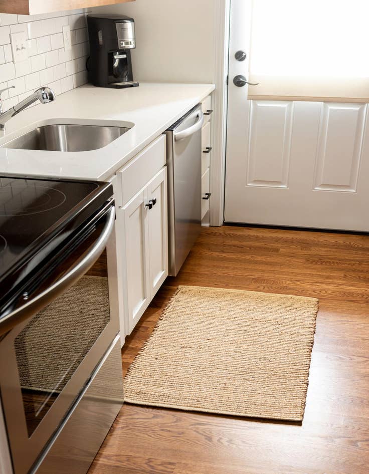 Detail image of  5' x 8'  Hand Woven Gilded Jute Rug