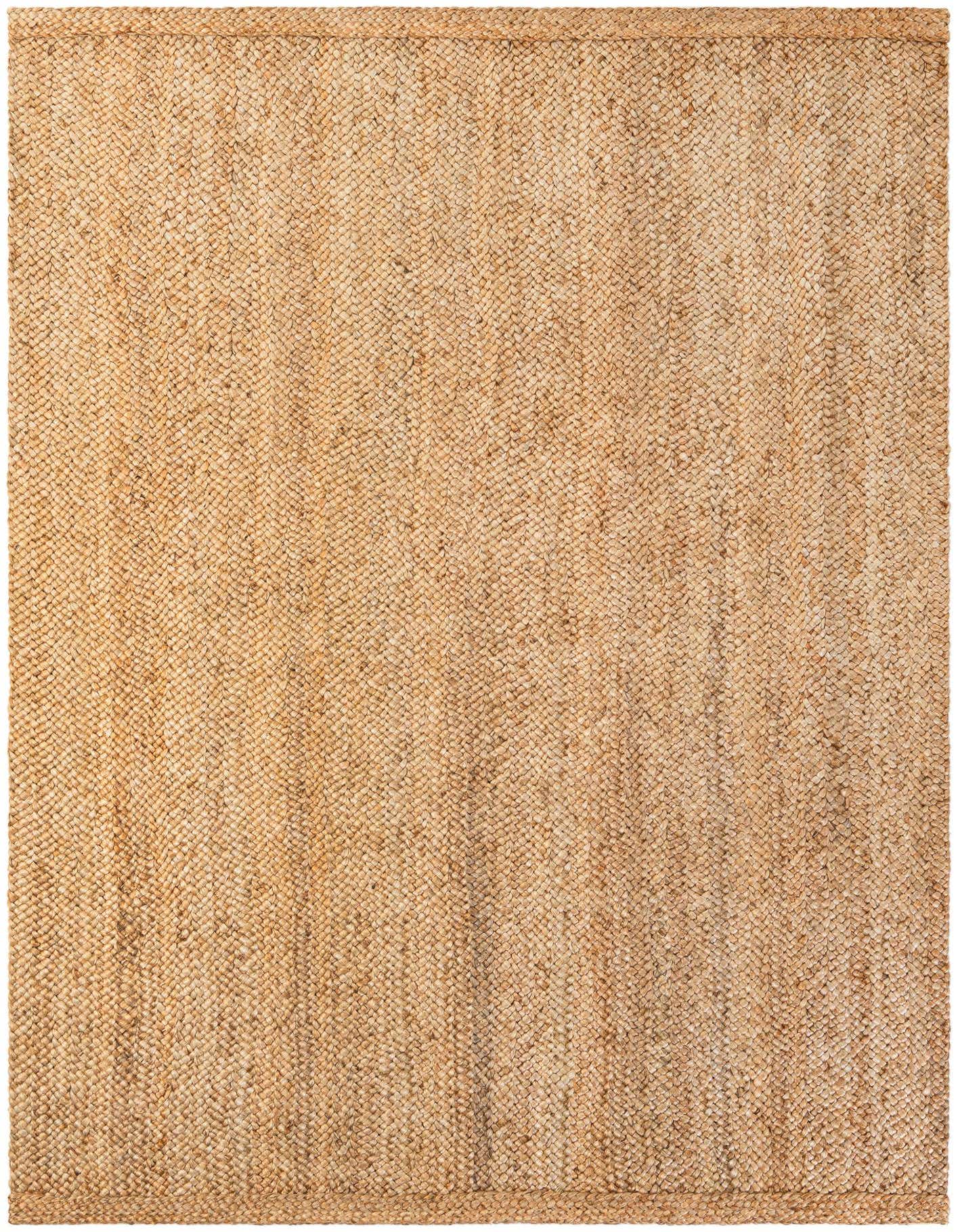 A 7x10 rectangular Heirloom Braided Jute rug in natural brown and tan tones, featuring a textured flatweave.