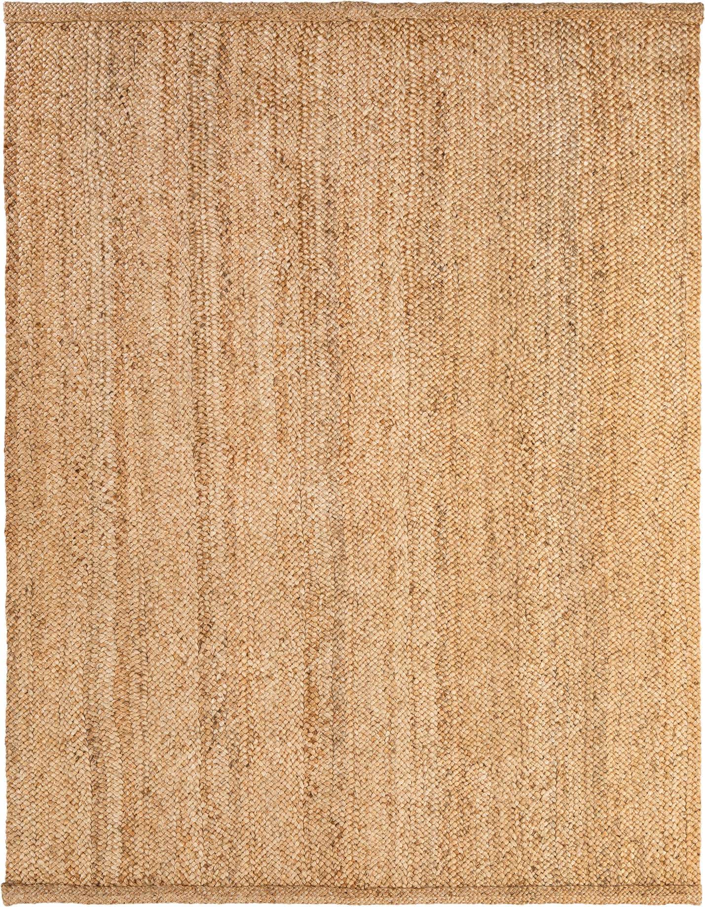 A rectangular 8x11 Heirloom Braided Jute rug in natural brown and tan tones, featuring a textured, solid flatweave pattern.