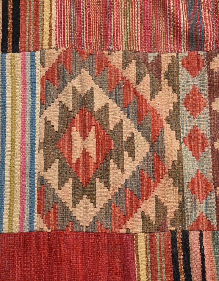 Detail image of  5' 11 x 7' 8  Hand Woven Kilim Patchwork Wool Rug