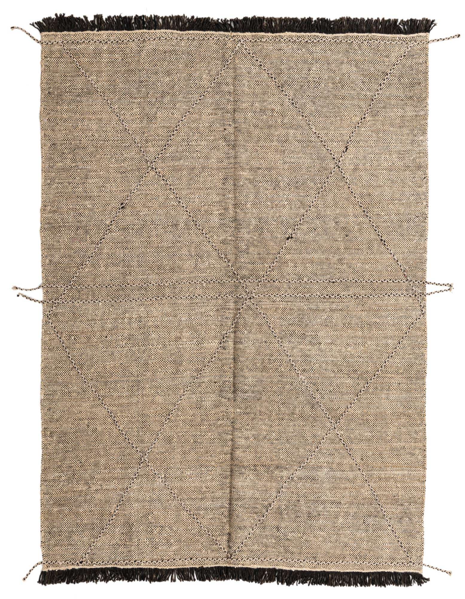 A 6x9 rectangular brown and cream tribal wool shag rug with a modern geometric diamond pattern and dark fringed ends.