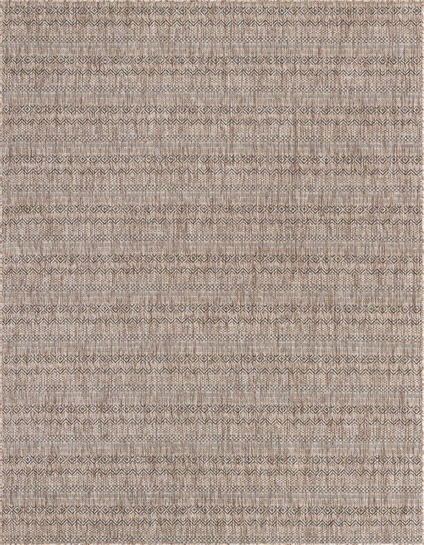 A 7x10 rectangular indoor/outdoor rug with a textured flatweave in shades of brown and tan, featuring a modern tribal pattern.