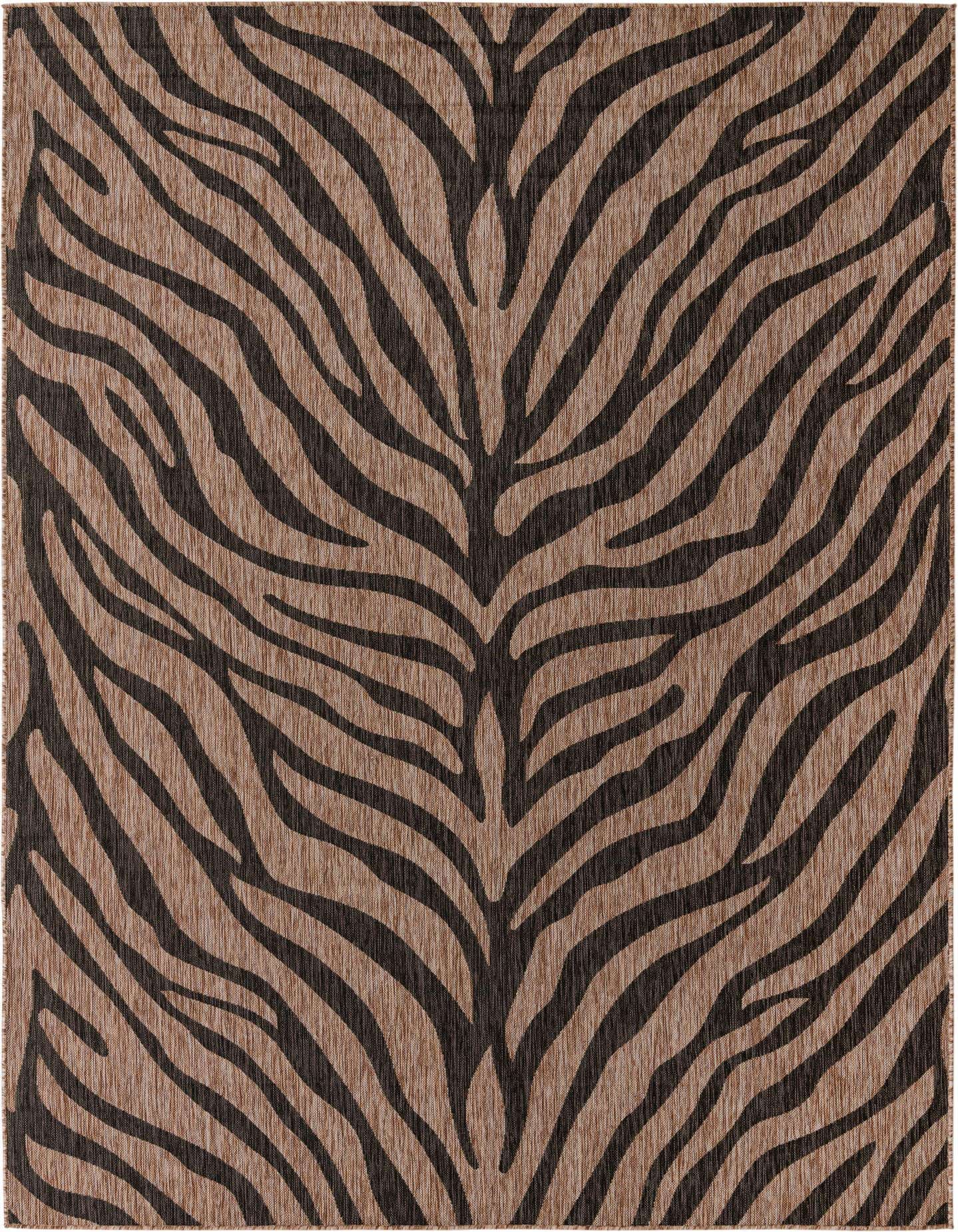 A brown and black zebra print rug with a modern stripe pattern, suitable for indoor or outdoor use.