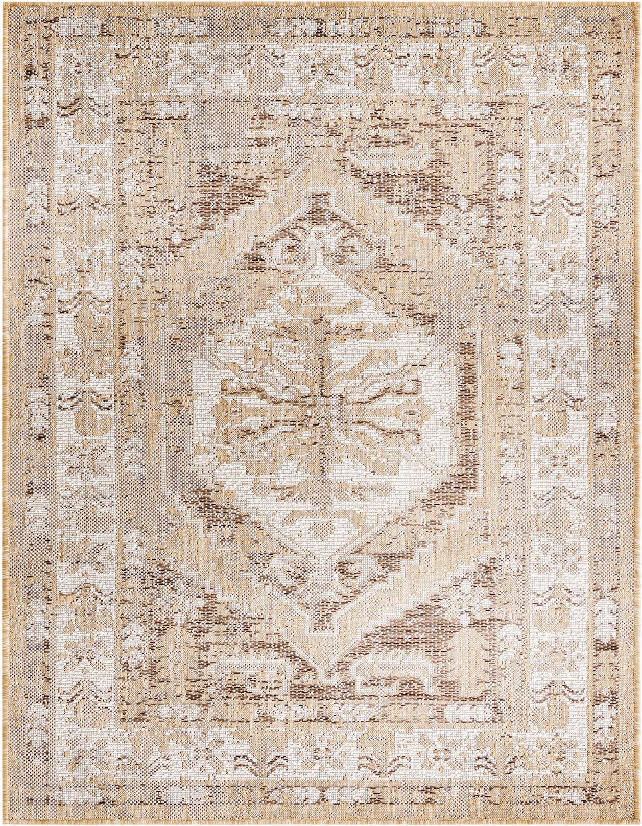 A 3x5 rectangular indoor/outdoor rug with a distressed Southwestern pattern in shades of brown, tan, and ivory.