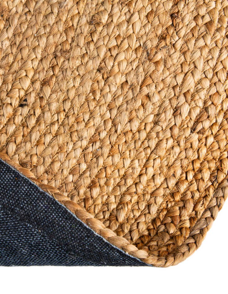 Detail image of  5' 1 x 5' 1  Hand Braided Jute Luxe Round Rug