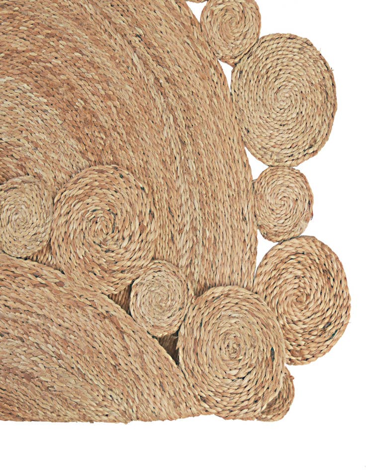 Detail image of  4' 1 x 4' 1  Hand Braided Jute Round Rug