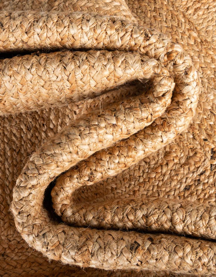 Detail image of  5' 1 x 5' 1  Hand Woven Scallop Braided Jute Round Rug