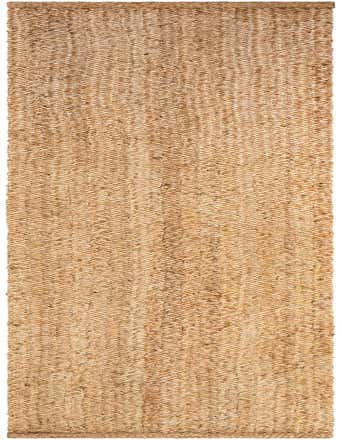 A 16 ft runner rug from the Heirloom Braided Jute collection, featuring a natural brown and tan braided jute texture, perfect for hallways.