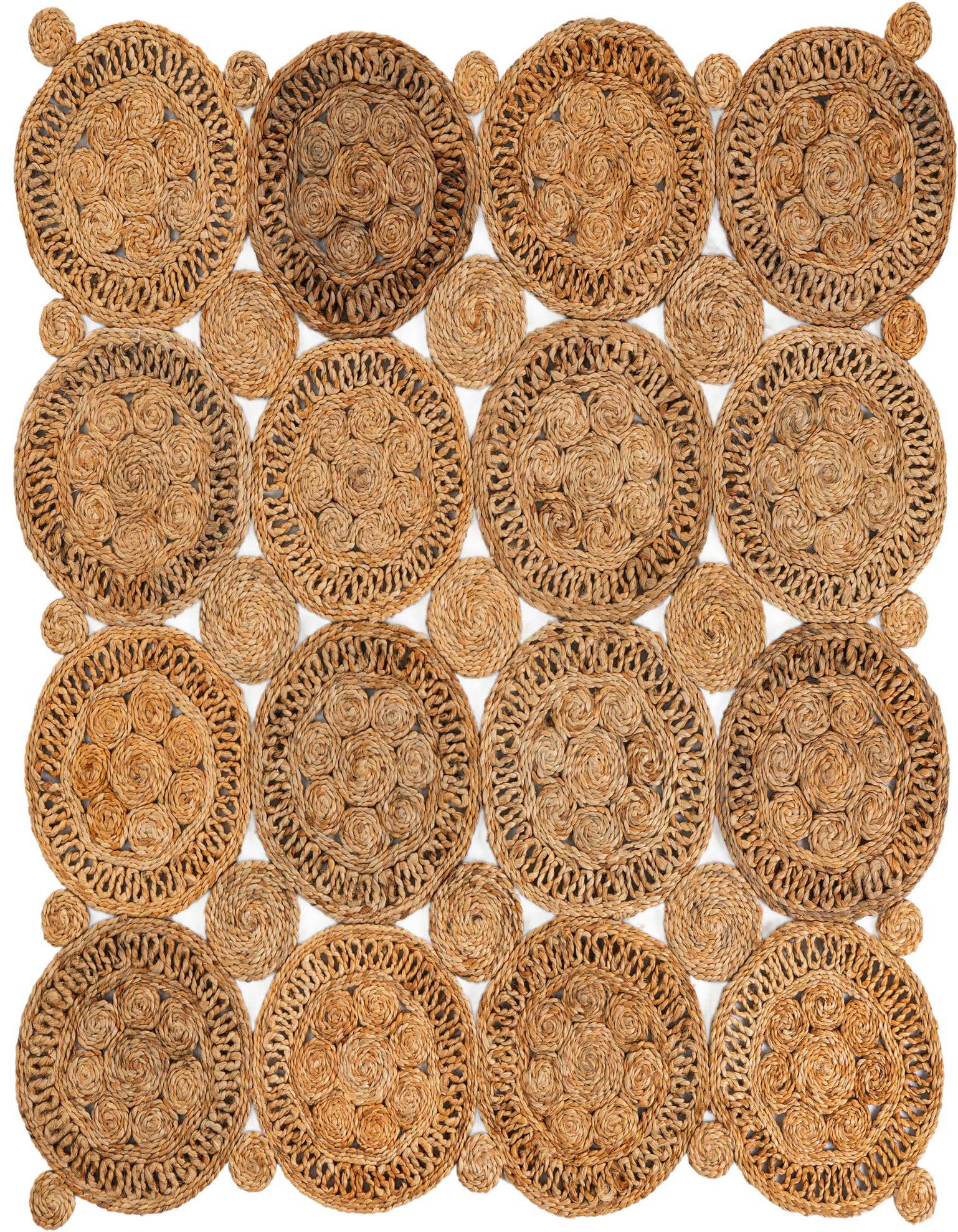 A square 4'1" x 4'1" natural jute rug with a tribal pattern of large and small braided circles in varying brown and tan tones.