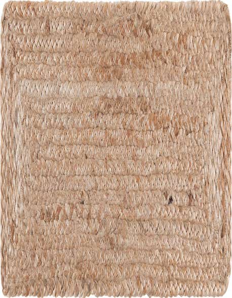 A 0' 9 x 2' 6 rectangular Braided Jute stair rug in natural brown and tan tones, featuring a textured, flatweave design.