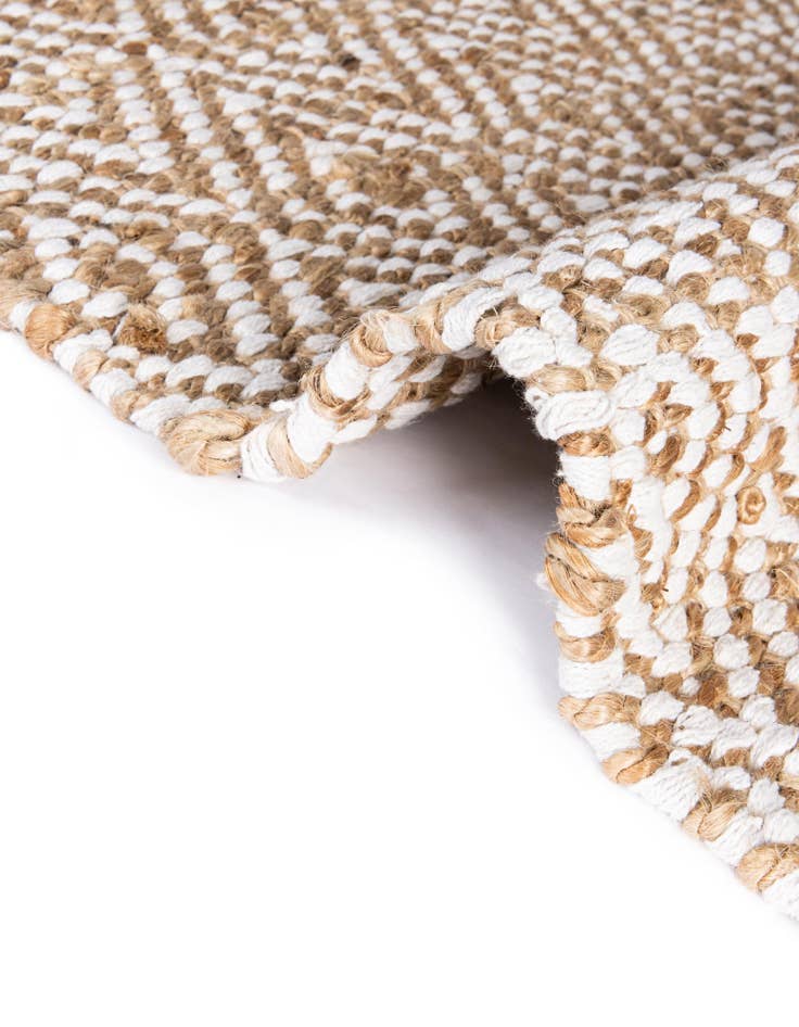 Detail image of  0' 9 x 2' 6  Hand Woven Braided Jute Stair Rug