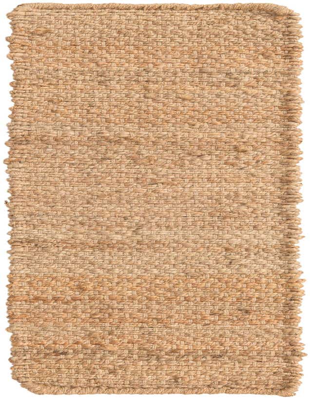 A close-up view of a 0' 9 x 2' 6 Chunky Jute stair rug, showcasing its natural brown and tan woven texture.