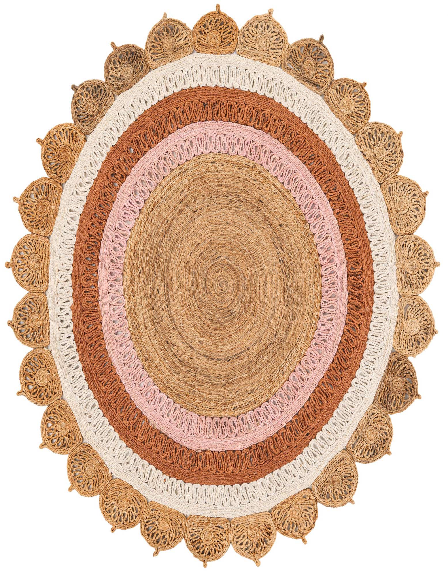 A round, handmade jute rug with concentric rings of natural, white, orange, and pink, and a decorative scalloped edge.