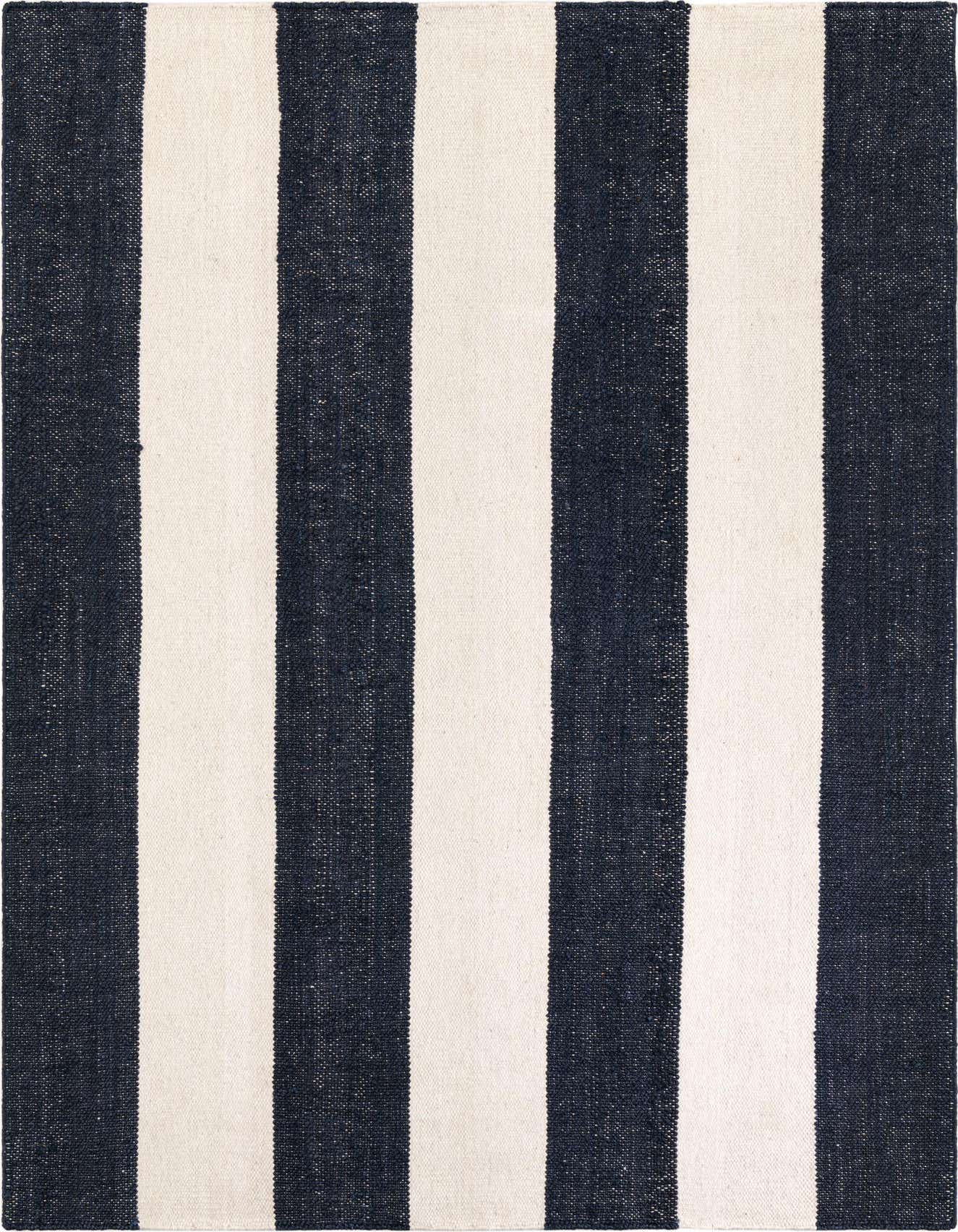 A 6x9 rectangular Jill Zarin Hamptons rug featuring bold navy blue and cream vertical stripes, perfect for a modern coastal living room.