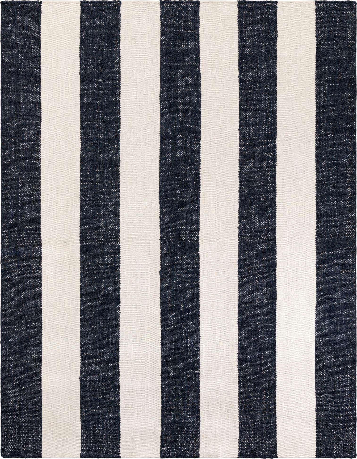 An 8x10 rectangular Jill Zarin Hamptons rug with wide vertical navy blue and ivory stripes, showcasing its textured flatweave.