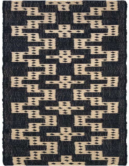 A 12 ft runner rug from the Kilim Wool collection, featuring a tribal geometric pattern in navy blue and cream.